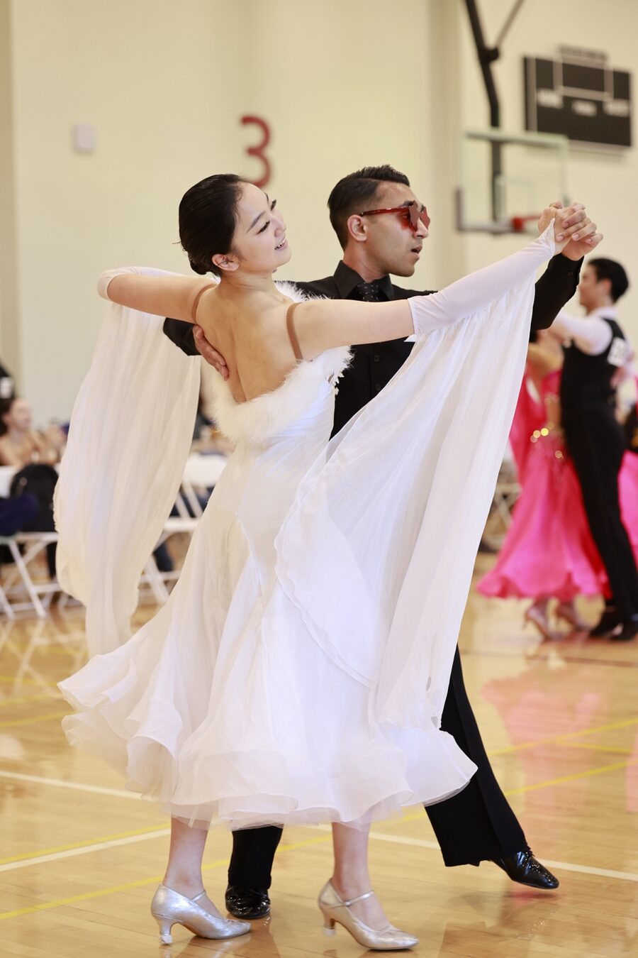 Rohit Nema and Yijia Shao dancing Standard at a ballroom competition