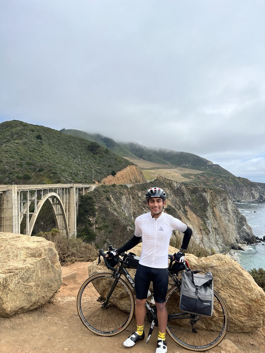 Rohit Nema with his bicycle at Bixby Bridge